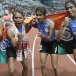 India's 4x400m relay team celebrate after winning the gold medal