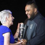 New Zealand weightlifter David Liti receives the David Dixon award for outstanding athlete of the Commonwealth Games