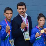 Union Sports Minister Rajyavardhan Singh Rathore poses with medal winners MC Mary Kom Gaurav Solanki Manish Kaushik and Amit at the Commonwealth Games 2018 in Gold Coast