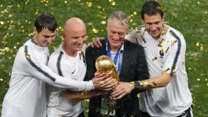 France coach Didier Deschamps with trophy as they celebrate winning the World Cup