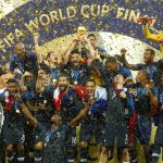 France players celebrate with the trophy after winning the World Cup 2018 title