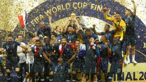 France players celebrate with the trophy after winning the World Cup 2018 title