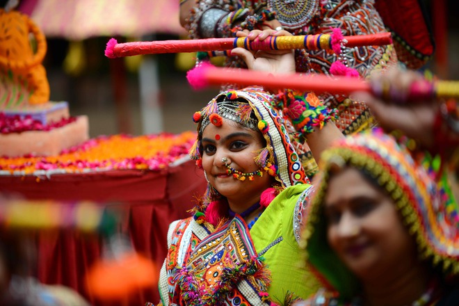 Folk dancers of the Panghat group of performing arts participate in a full dress rehearsal ahead of Navratri festival in Ahmedabad on September 22, 2019.
