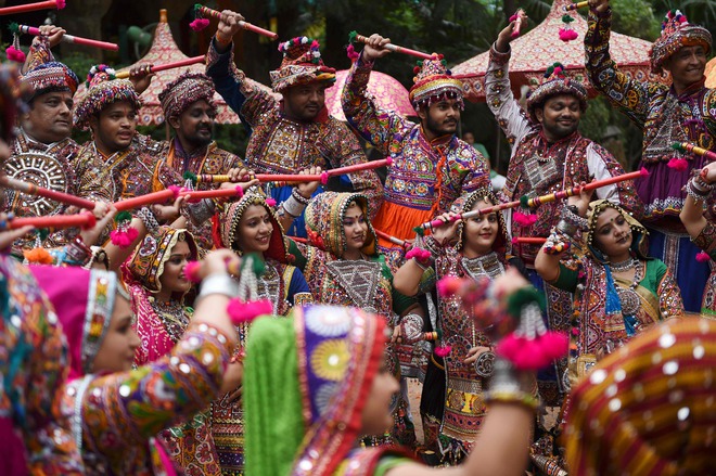 Folk dancers of the Panghat group of performing arts participates in a full dress rehearsal ahead of Navratri festival in Ahmedabad on September 22, 2019.