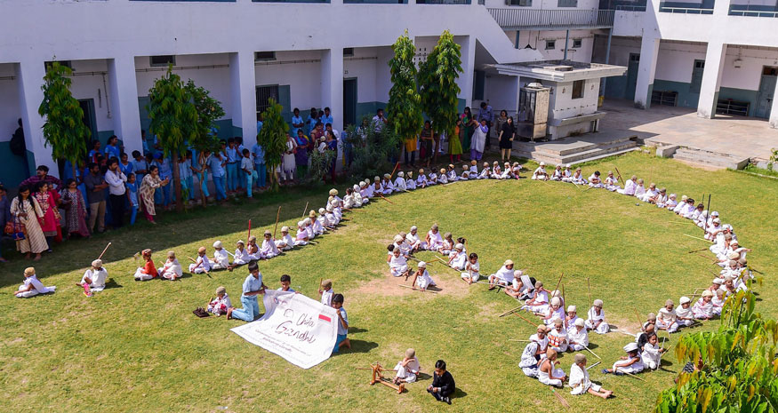 Students of a pre school, dressed up as Mahatma Gandhi participate in a function organised by Gujarat Vidyapith to celebrate Gandhi Jayanti in Ahmedabad