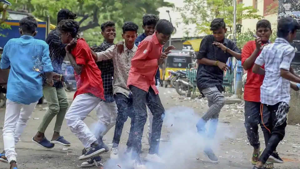 Youngsters burst firecrackers as they celebrate Diwali in Chennai. People in Tamil Nadu began celebrating Diwali, starting off with special sesame oil bath, wearing new clothes and bursting firecrackers