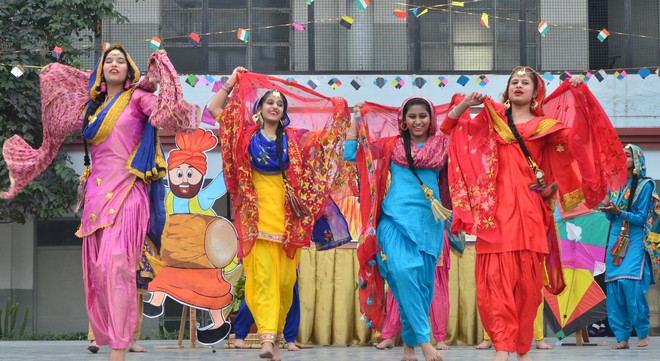 Students and teachers of Police DAV School perform a cultural programme during celebrated Lohri in school campus Jalandhar Cantt