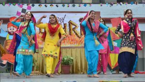 Students and teachers of Police DAV School perform a cultural programme during celebrated Lohri in school campus Jalandhar Cantt