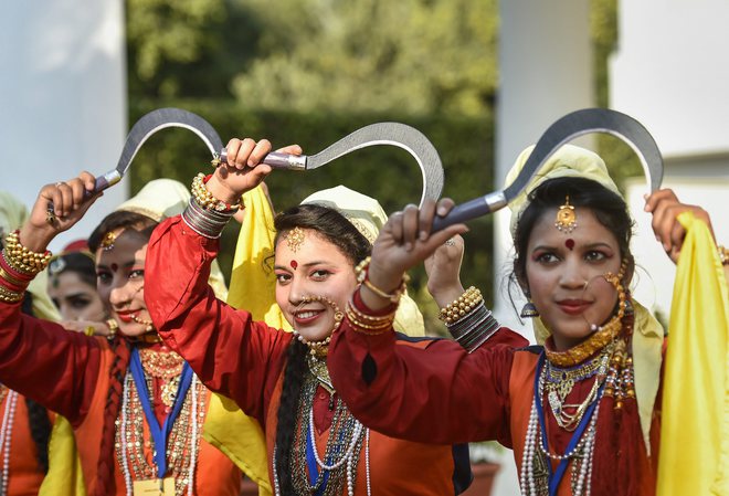 Tableau artists from Uttarakhand, who participated on Republic Day Parade 2019, perform during the interaction with Vice President Venkaiah Naidu at his residence, in New Delhi.