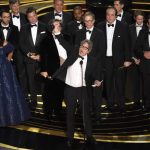 Peter Farrelly (centre) and the cast and crew of ‘Green Book’ accept the award for best picture at the Oscars on February 24, 2019, at the Dolby Theatre in Los Angeles.