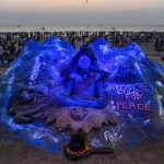 A view of a sand sculpture of Lord Shiva, created by artist Laxmi Gaud, on the occasion of Maha Shivratri at Juhu beach in Mumbai