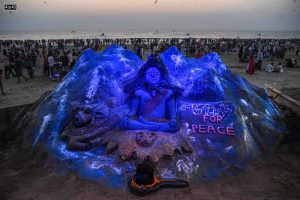 A view of a sand sculpture of Lord Shiva, created by artist Laxmi Gaud, on the occasion of Maha Shivratri at Juhu beach in Mumbai