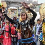 An artist dressed as Hindu deity Shiva performs a dance during a religious procession on the occasion of Maha Shivaratri festival, in Amritsar