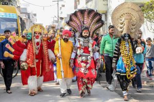 Artists dressed as Hindu deities Shiva, Mata Kali and Hanuman walk as they take part in a religious procession on the occasion of Maha Shivaratri festival, in Amritsar