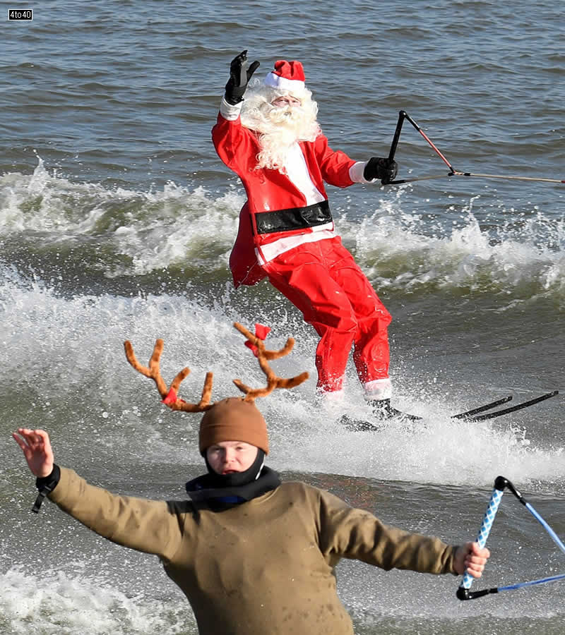 The ‘Waterskiing Santa’ makes his annual Christmas Eve appearance with one of his ‘reindeers’ on the Potomac River along the Alexandia, Virginia waterfront in US on December 24, 2019.