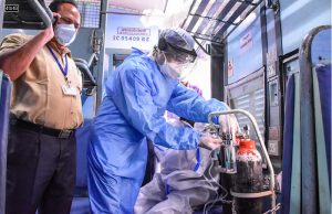 A medical staff arranges oxygen cylinders for COVID-19 patients inside a COVID care train coach, at Madan Mahal Railway station in Jabalpur on May 4, 2021