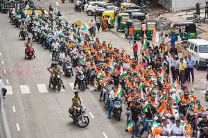 Locals carry out a 'Tiranga Yatra' on the occasion of Kargil Vijay Diwas, in Surat.