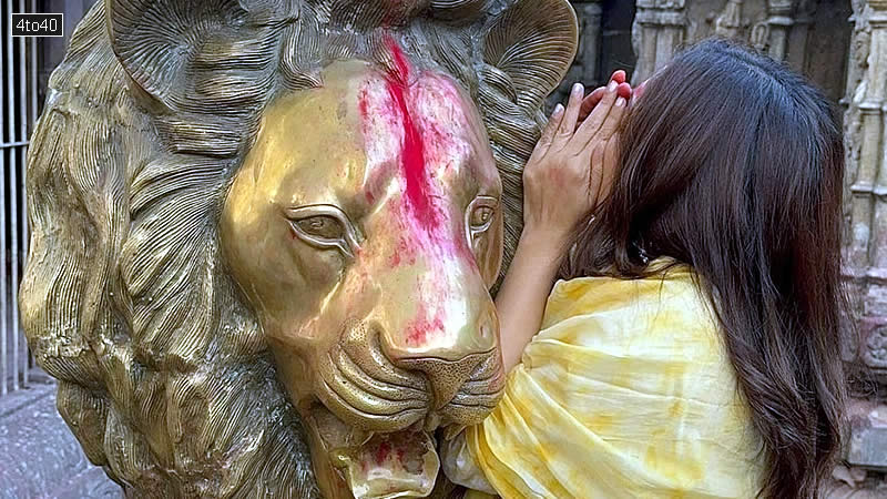 Bhumi Pednekar is seen whispering her wish in the ear of a lion idol