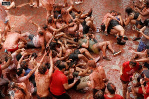 Tomatina Festival begins at 12am with a bang