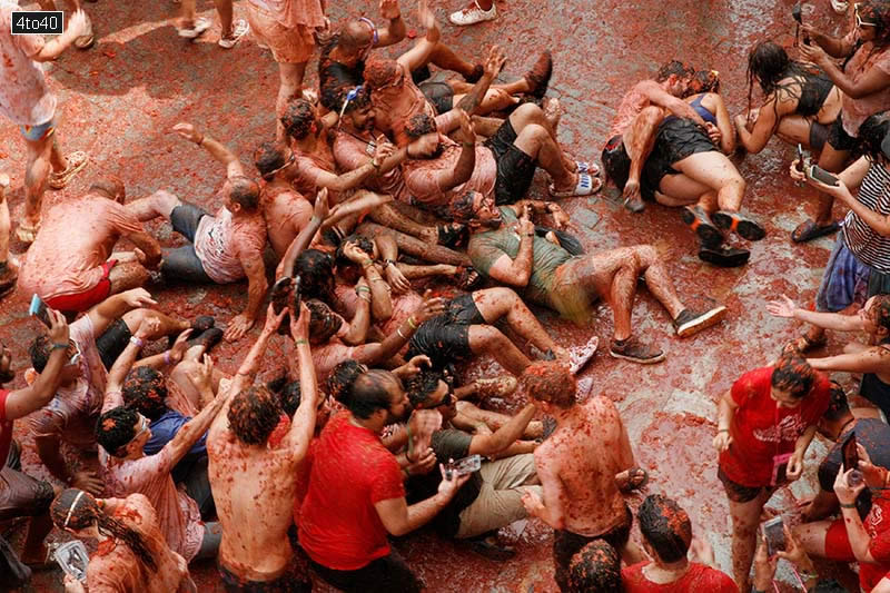 Tomatina Festival begins at 12am with a bang