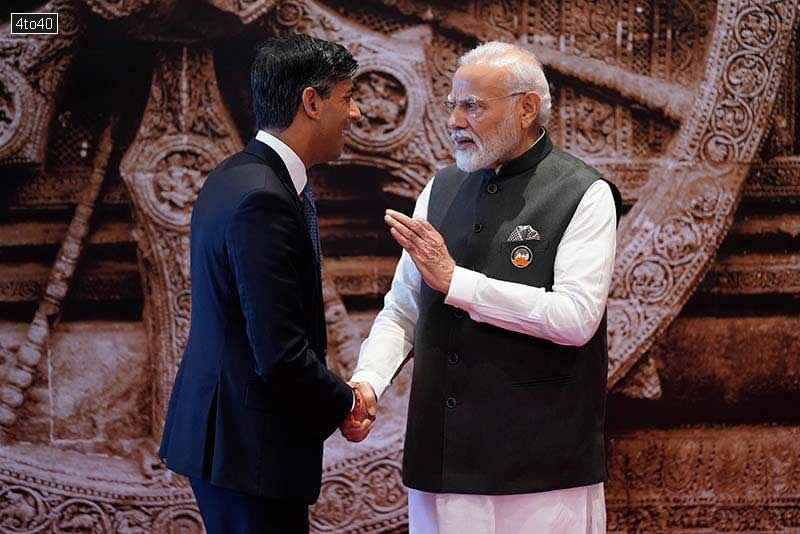 PM Modi greets British counterpart Rishi Sunak