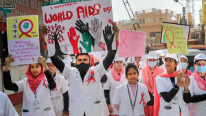 Nursing students take part in an AIDS awareness rally on World AIDS Day, in Jammu