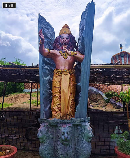 Statue of Lord Narasimha breaking his way out of a pillar