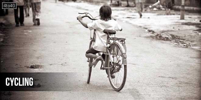 Kid riding an oversized cycle