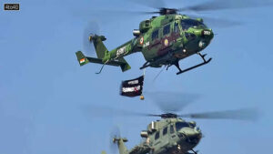 Indian Army helicopters fly over New Delhi's Kartavya Path with the Operation Sindoor flag during the 77th Republic Day parade