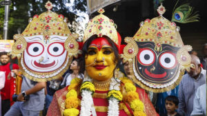 A devotee dresses up to signify to Lord Jagannath, His brother Balabhadra, and His sister Subhadra