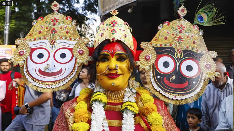 A devotee dresses up to signify to Lord Jagannath, His brother Balabhadra, and His sister Subhadra