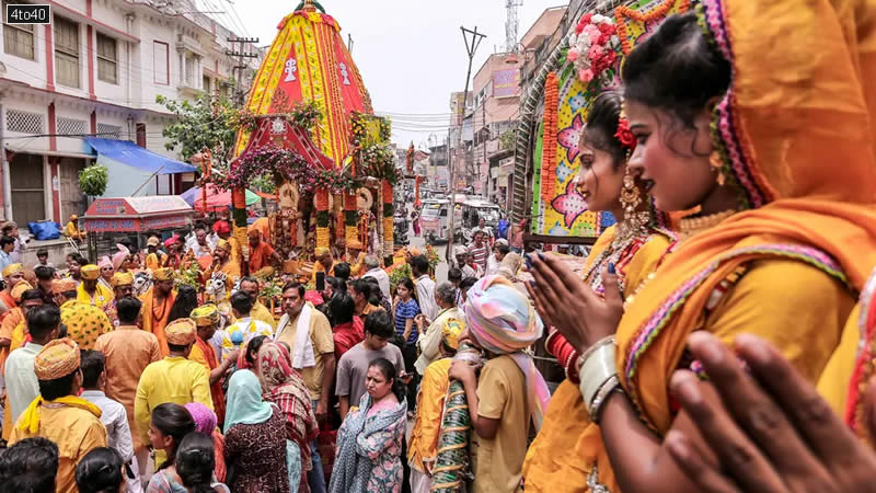 Devotees pull the chariot carrying the idols of Lord Jagannath