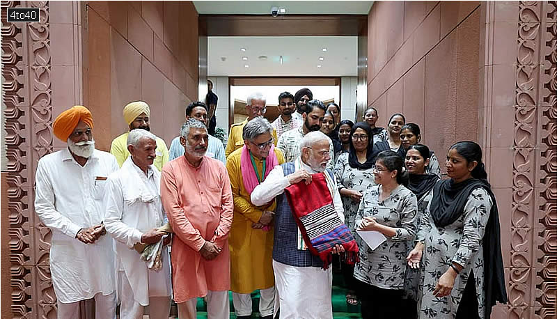 On National Handloom Day, a 20-member delegation from Punjab Kheti Virasat Mission (KVM) met PM Modi